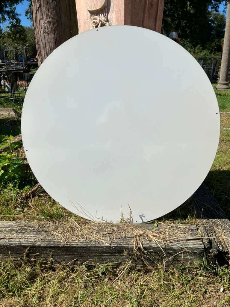 30-Inch Diameter Vintage Texaco Motor Oil Gasoline Steel Sign on a grassy surface, showing a blank white circle.