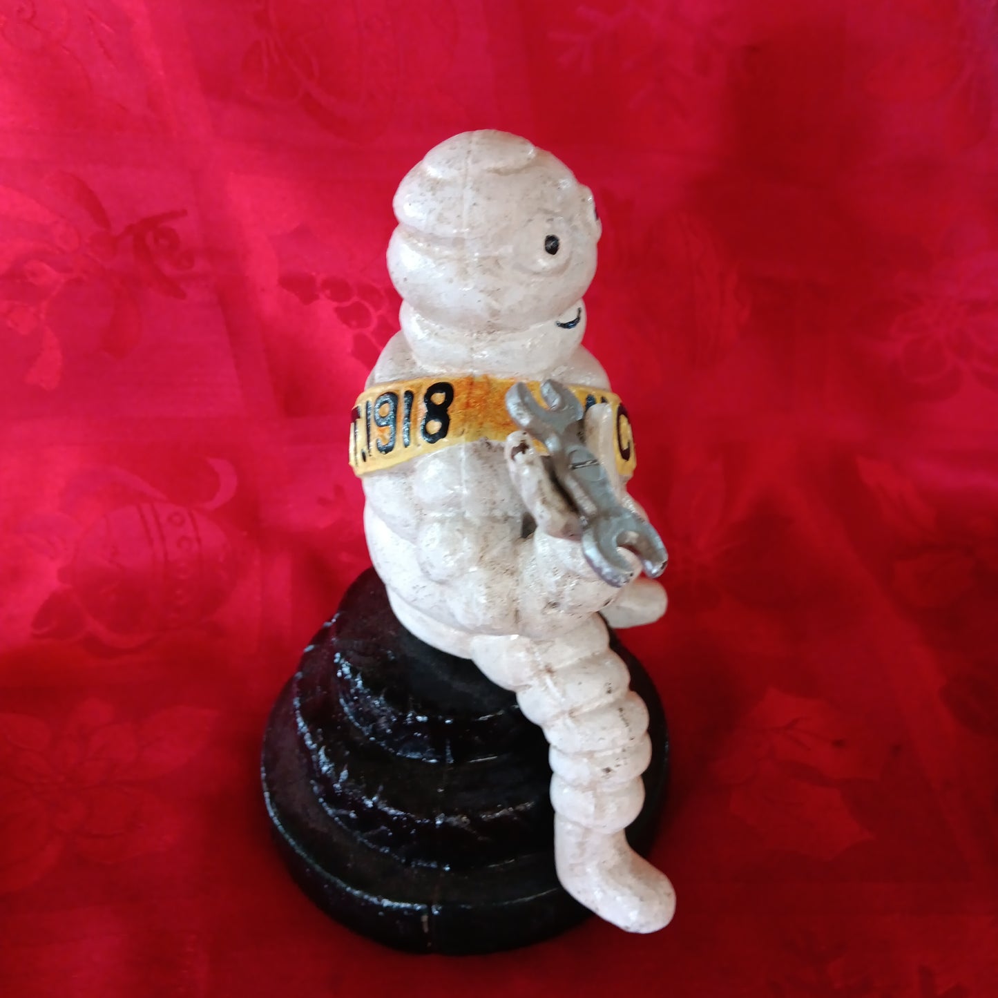 Michelin Figurine -Cast Iron Michelin Man Sitting on Tire Advertising Piece-Jantiques LLC.