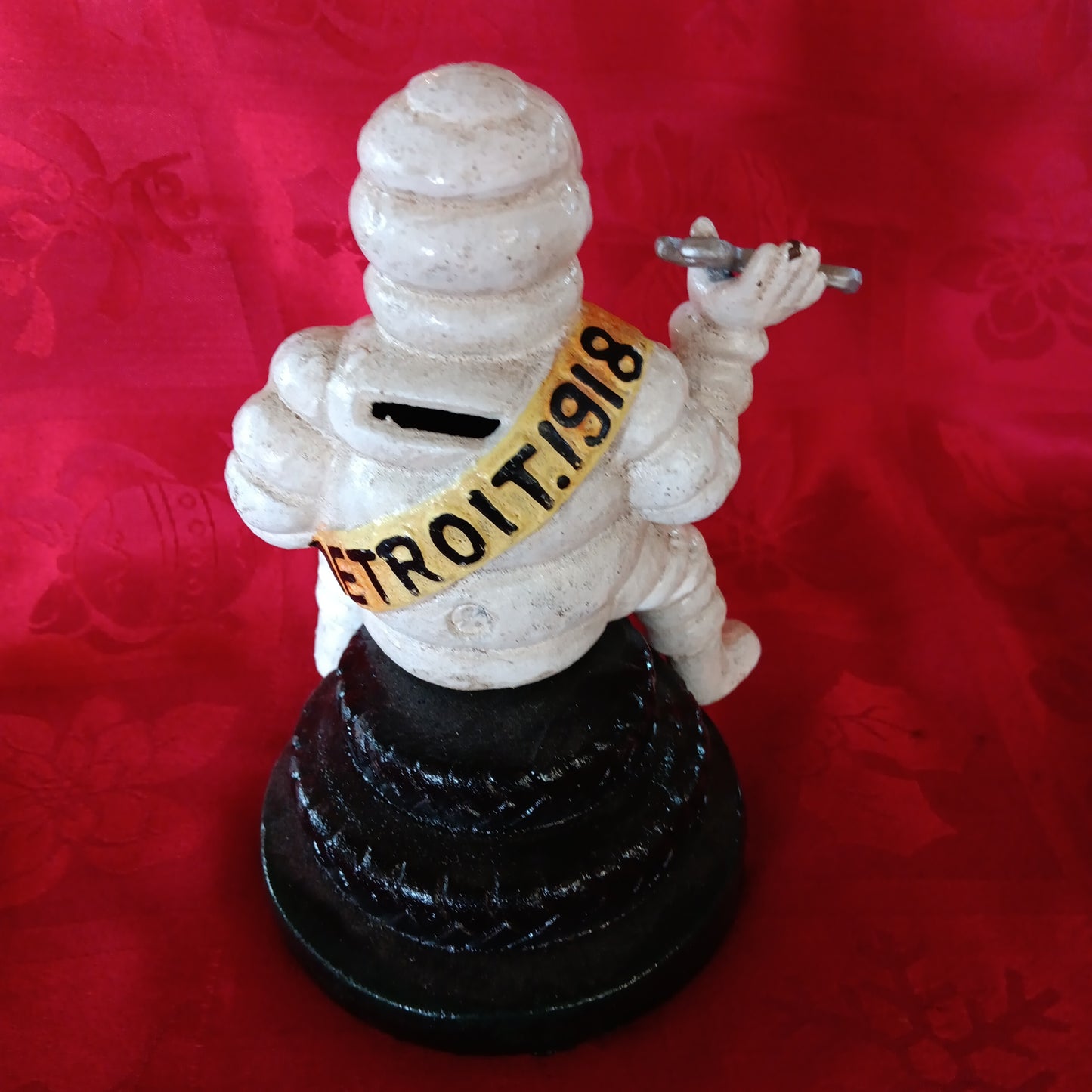 Michelin Figurine -Cast Iron Michelin Man Sitting on Tire Advertising Piece-Jantiques LLC.