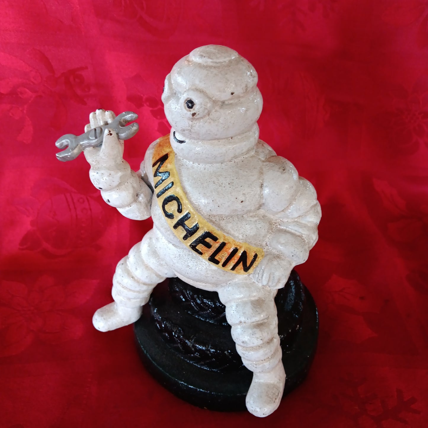 Michelin Figurine -Cast Iron Michelin Man Sitting on Tire Advertising Piece-Jantiques LLC.