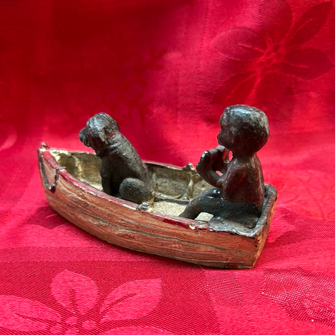 Lead Black Americana Watermelon Boy With Dog in boat-Jantiques LLC.