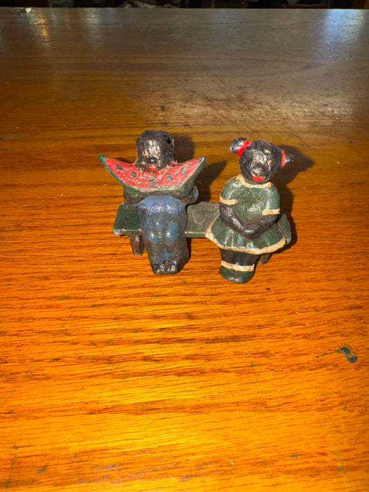 Lead Black Americana Kids Sitting on Bench