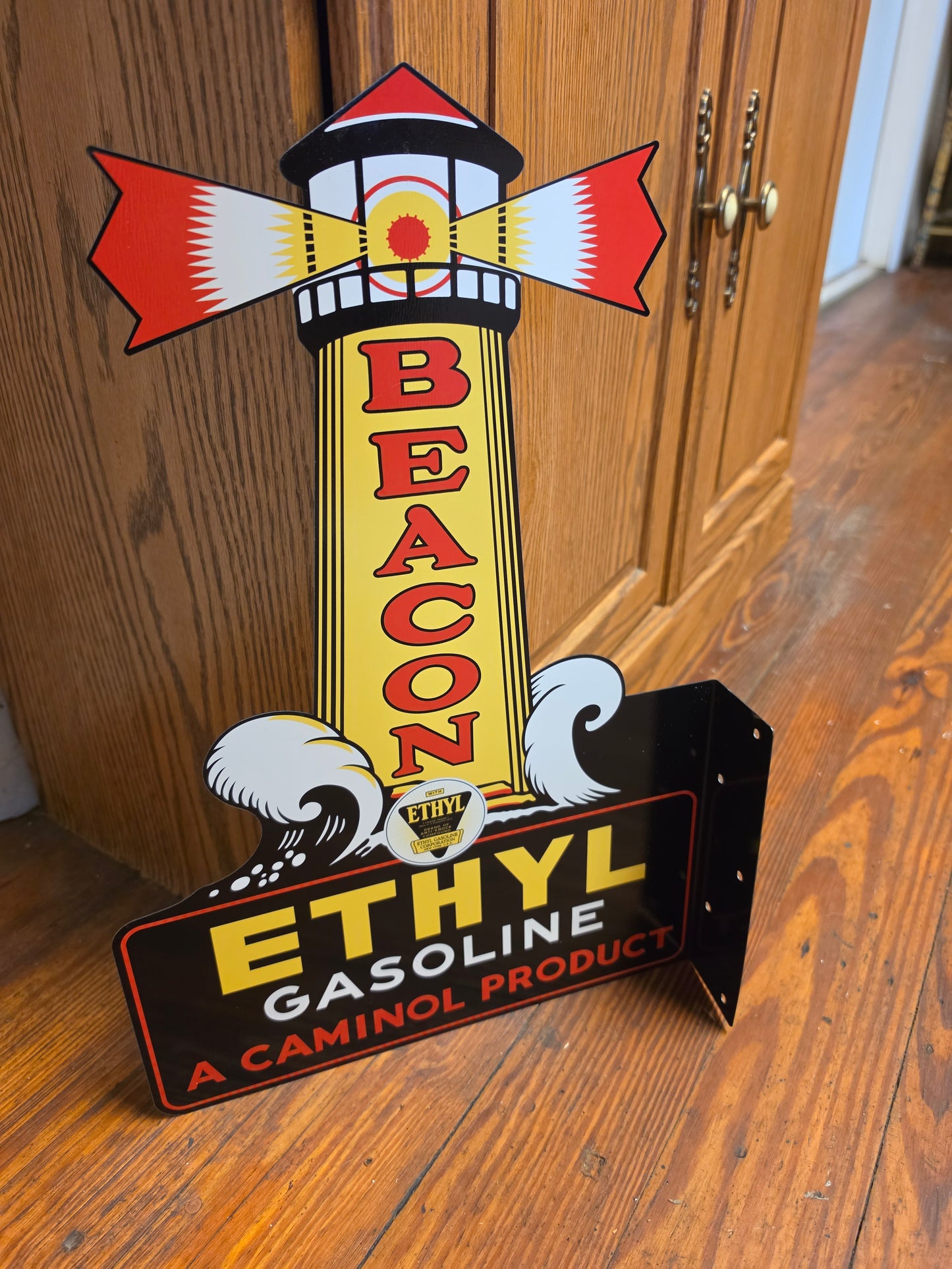 Beacon Ethyl Gasoline Lighthouse metal sign featuring a side mounting flange. Double sided. Made in the USA