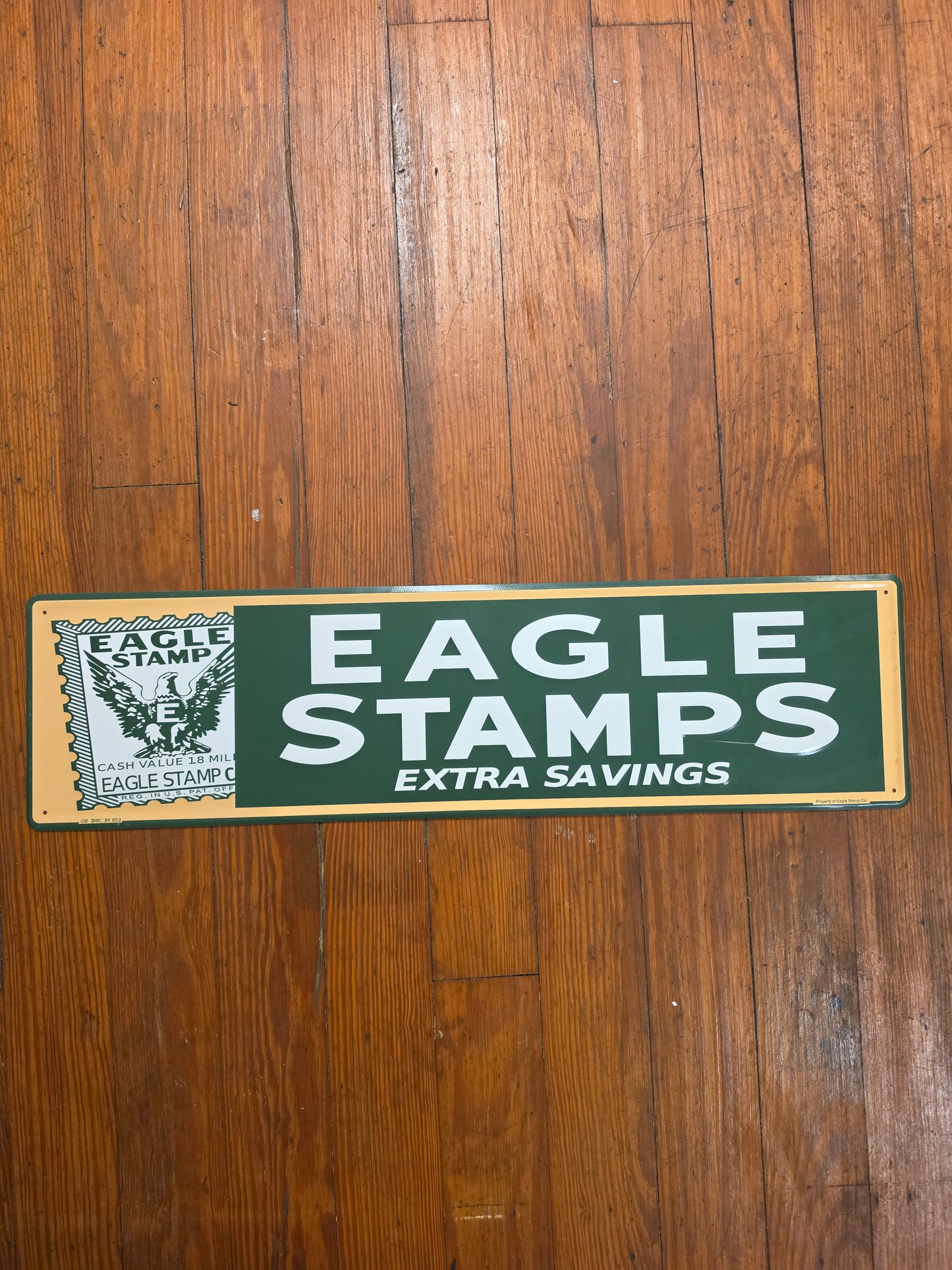 Eagle Stamps Extra Savings metal sign