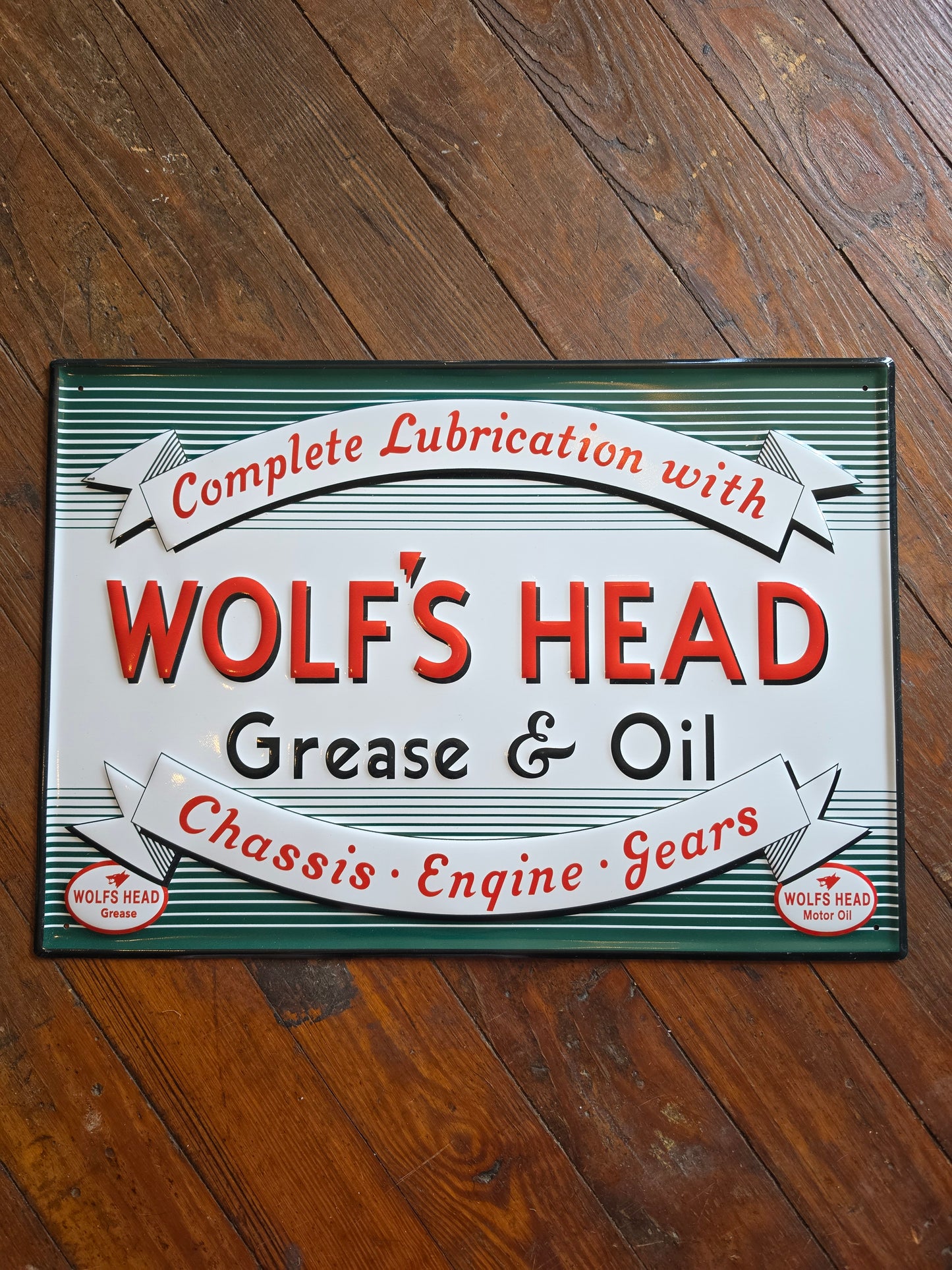 Wolf's Head Grease &Oil metal sign