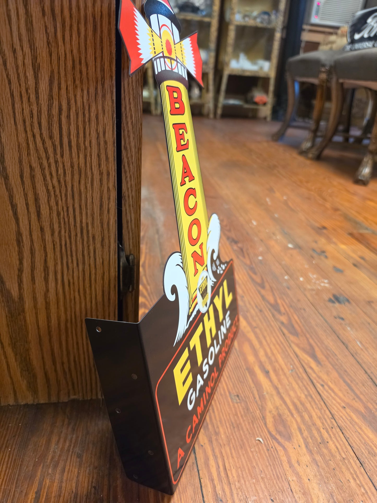 Beacon Ethyl Gasoline Lighthouse metal sign featuring a side mounting flange. Double sided. Made in the USA