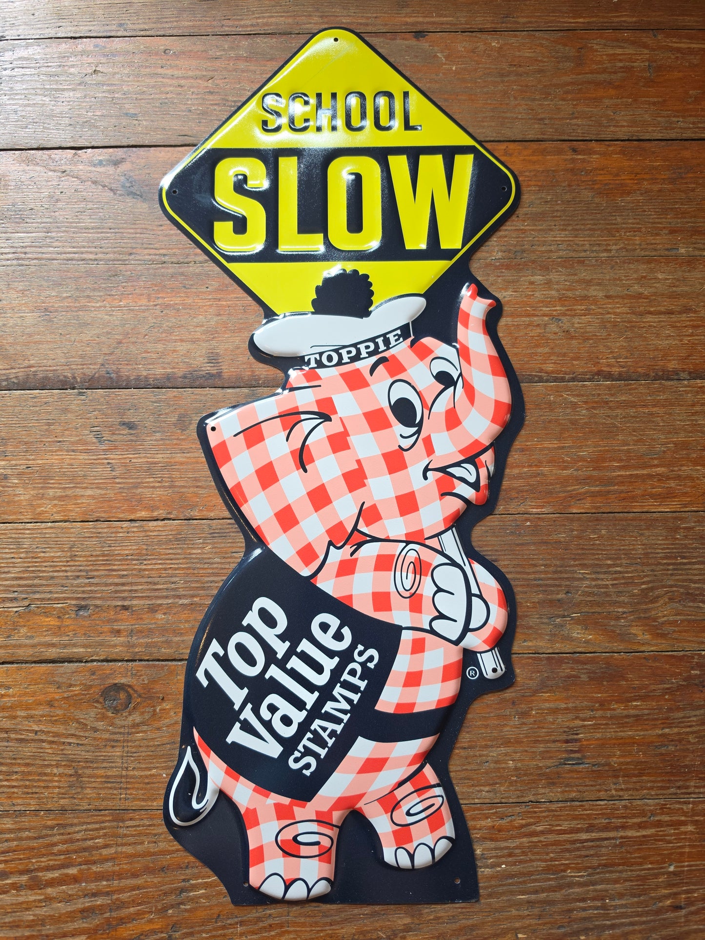 Mascot Toppie for Top Value Stamps metal sign
