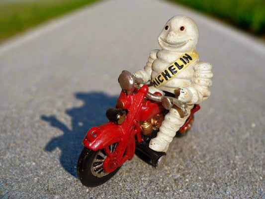 Michelin Figurine - Cast Iron Michelin Man Vintage Toy w/ Motorcycle-Jantiques LLC.