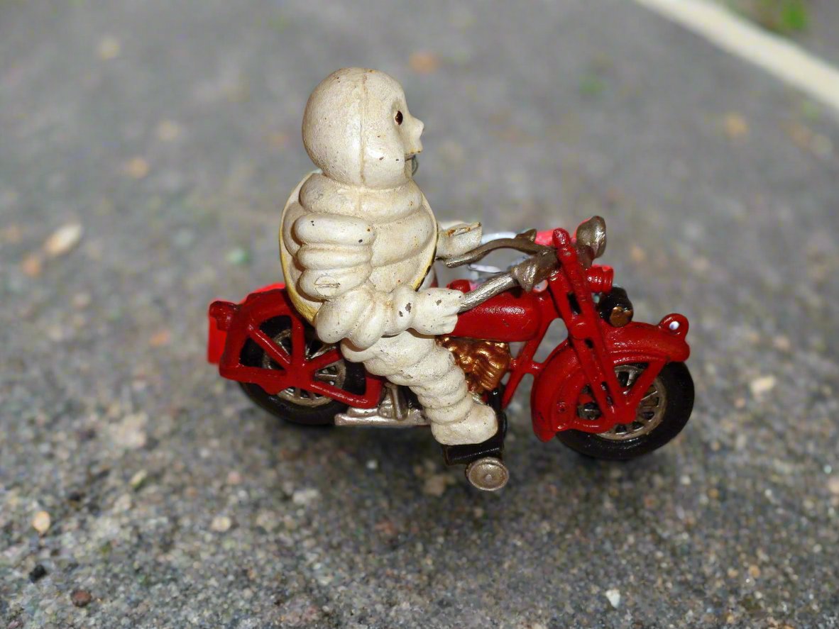 Michelin Figurine - Cast Iron Michelin Man Vintage Toy w/ Motorcycle-Jantiques LLC.