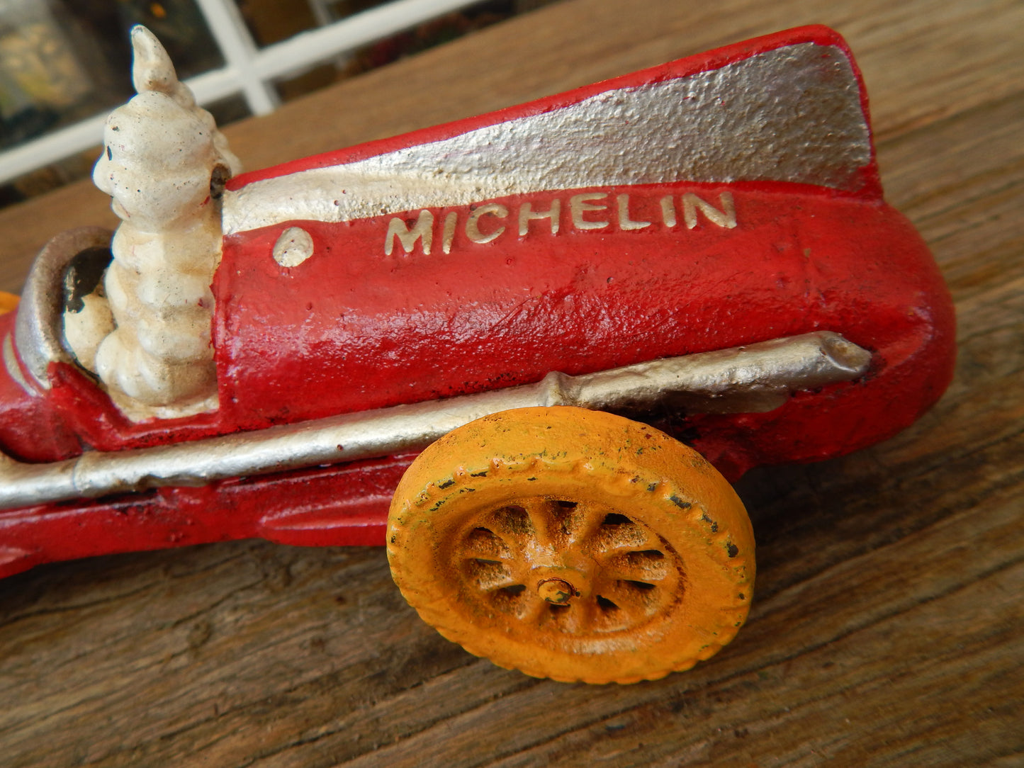 Michelin Figurine - Cast Iron Michelin Tire Advertising Red Race Car Toy-Jantiques LLC.