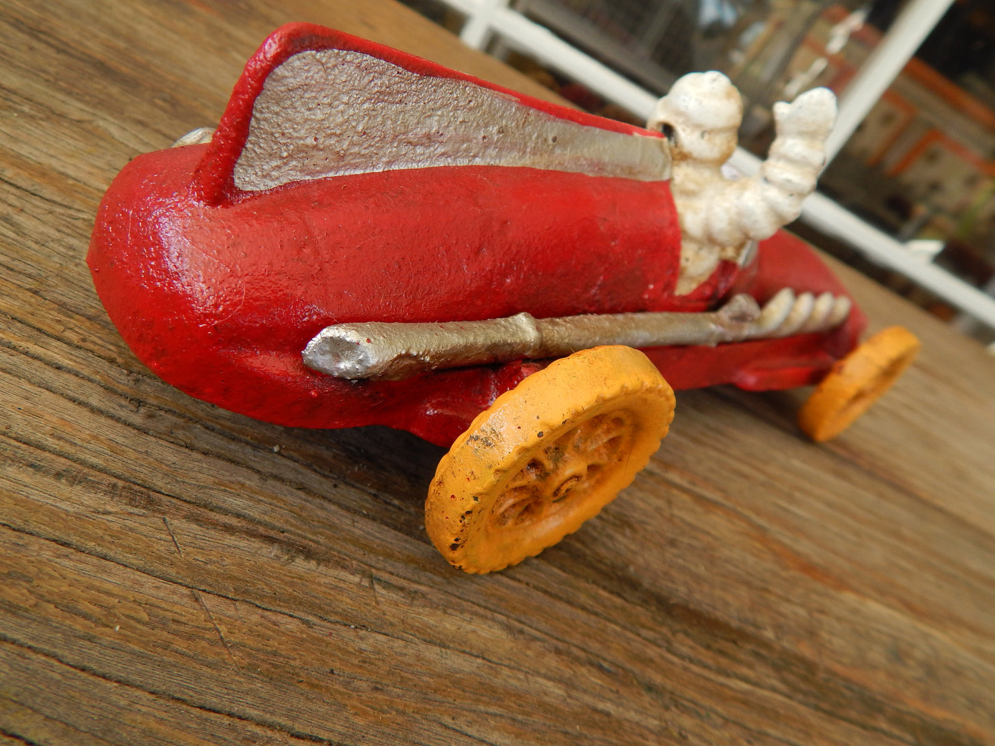 Michelin Figurine - Cast Iron Michelin Tire Advertising Red Race Car Toy-Jantiques LLC.