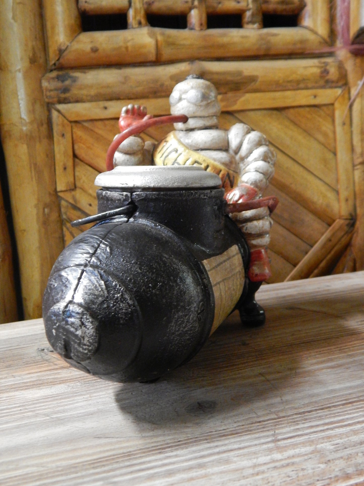 Michelin Figurine -Cast Iron Michelin Tire Man Bibendum on Compressor-Jantiques LLC.