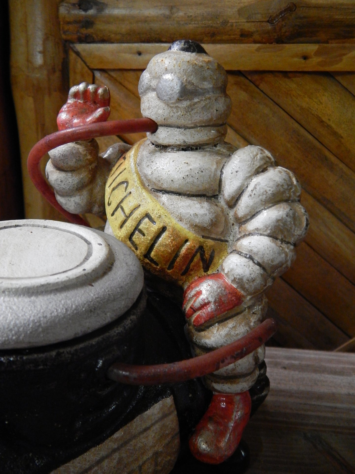 Michelin Figurine -Cast Iron Michelin Tire Man Bibendum on Compressor-Jantiques LLC.