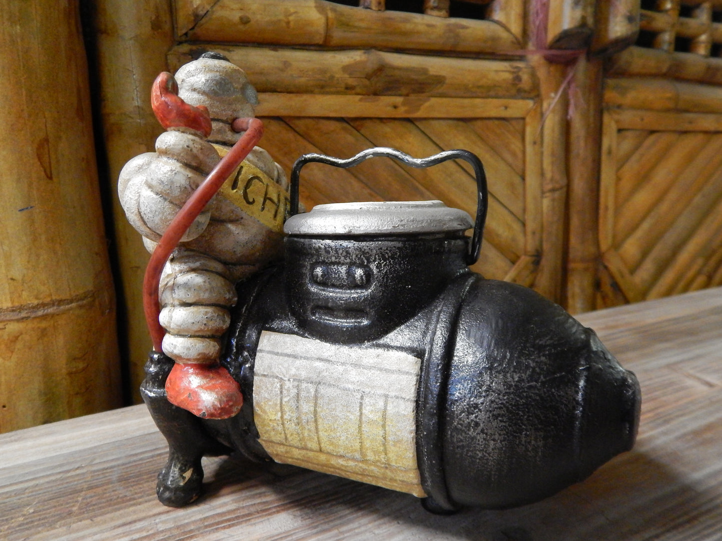 Michelin Figurine -Cast Iron Michelin Tire Man Bibendum on Compressor-Jantiques LLC.