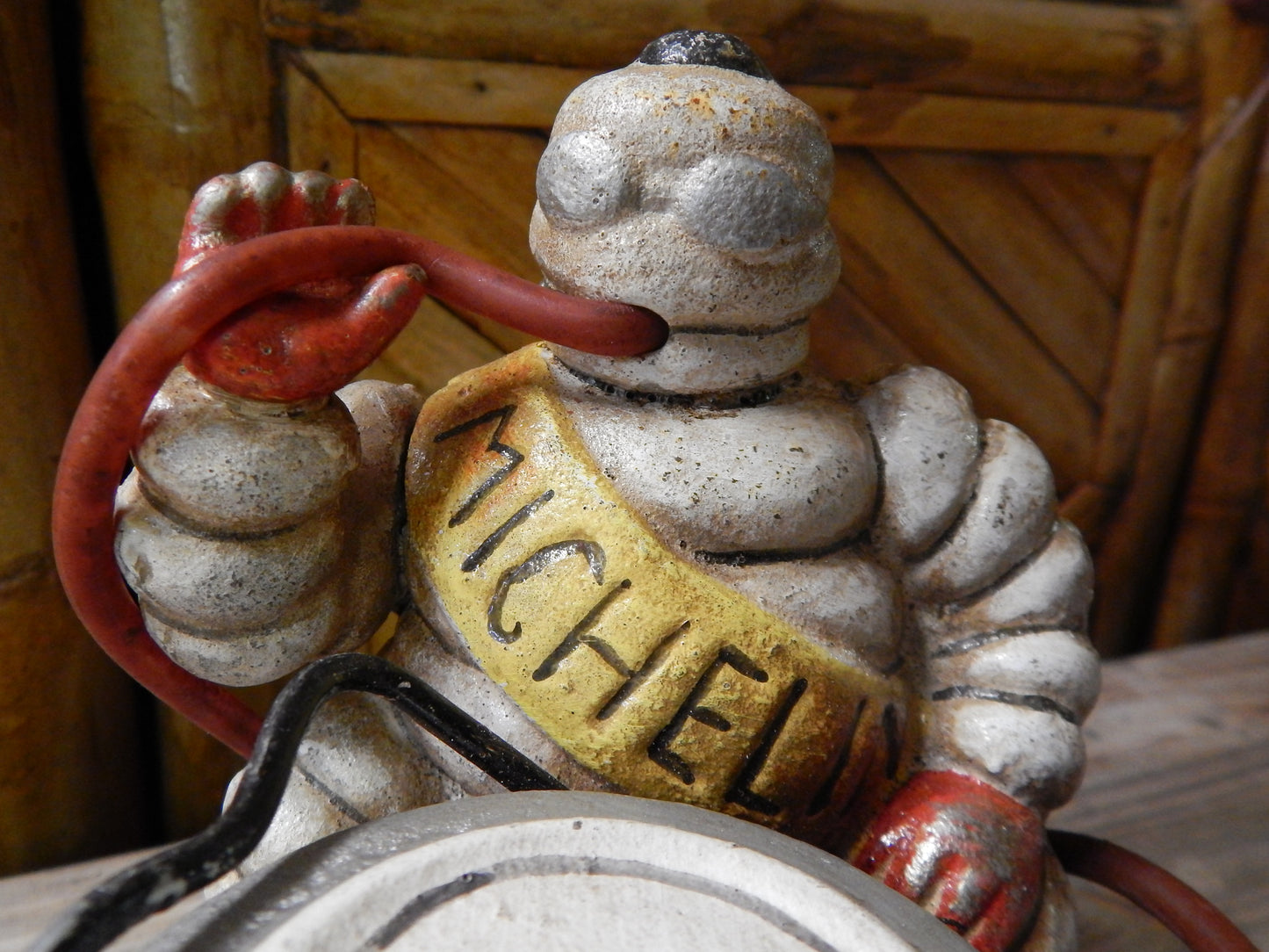 Michelin Figurine -Cast Iron Michelin Tire Man Bibendum on Compressor-Jantiques LLC.