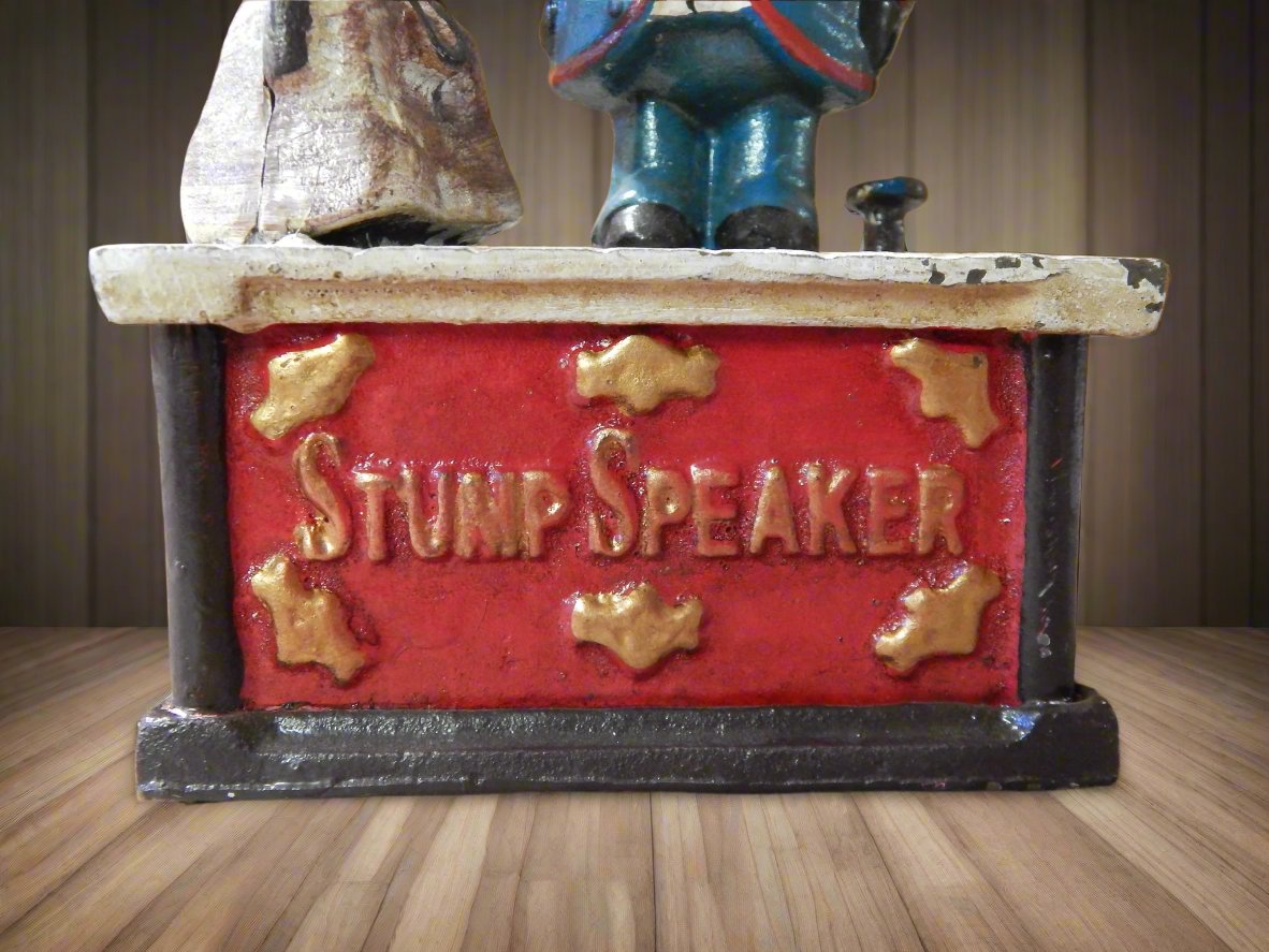 Cast Iron Mechanical Bank - Americana Stump Speaker-Jantiques LLC.