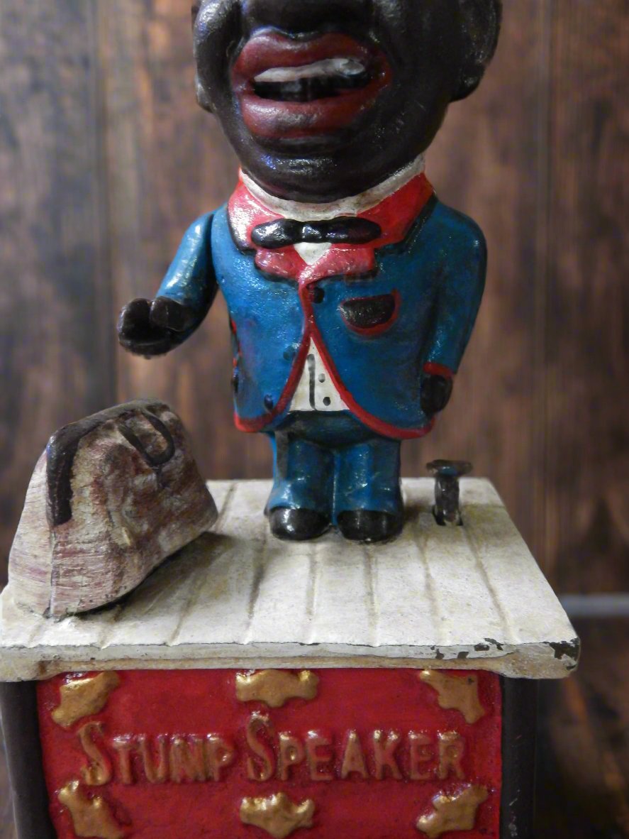 Cast Iron Mechanical Bank - Americana Stump Speaker-Jantiques LLC.