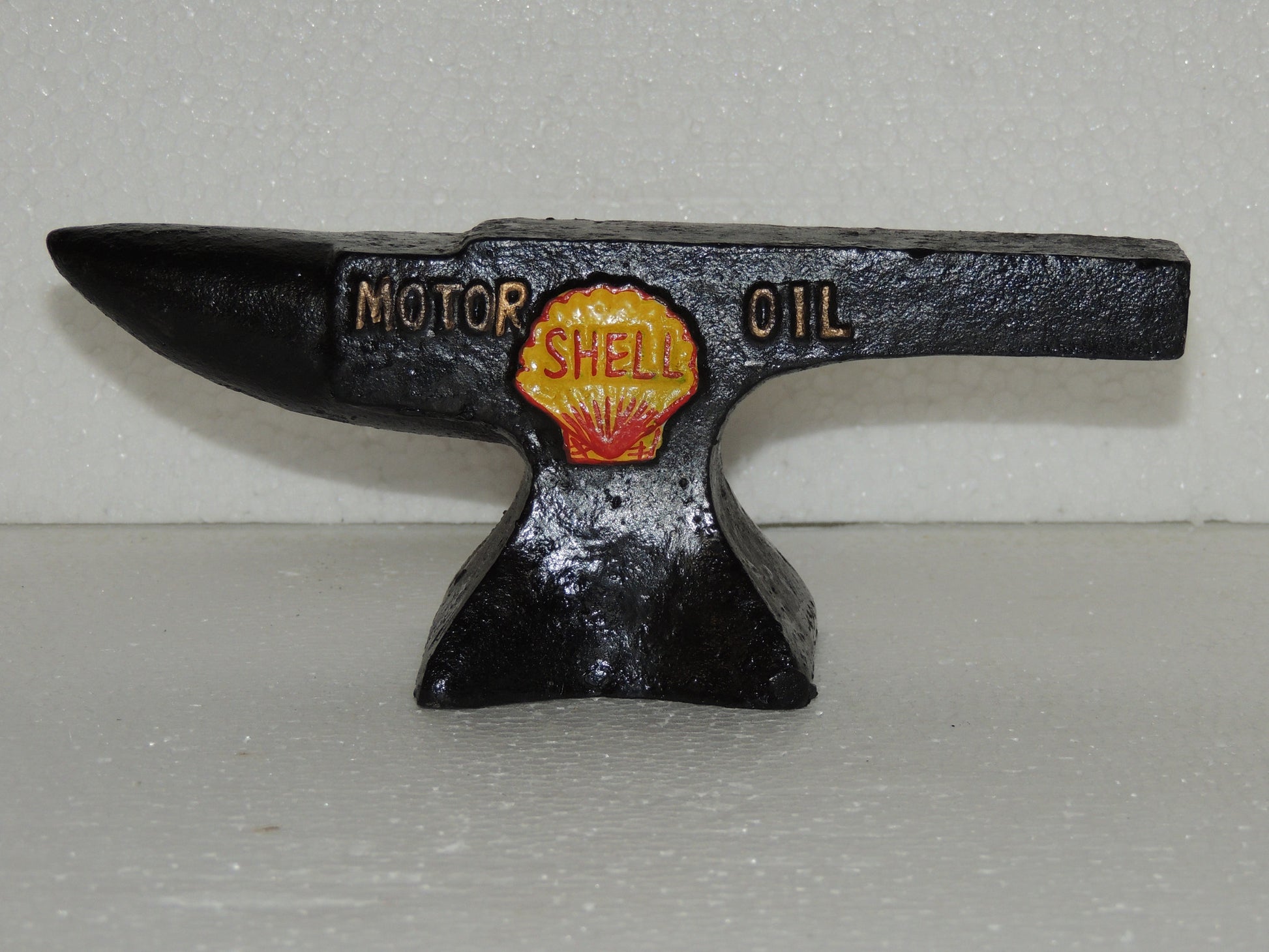 SHELL - CAST IRON Display "ANVIL SHELL 1927"-Jantiques LLC.