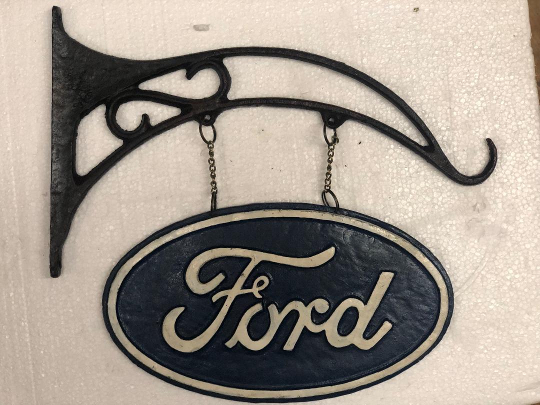 cast iron Ford sign-Jantiques LLC.