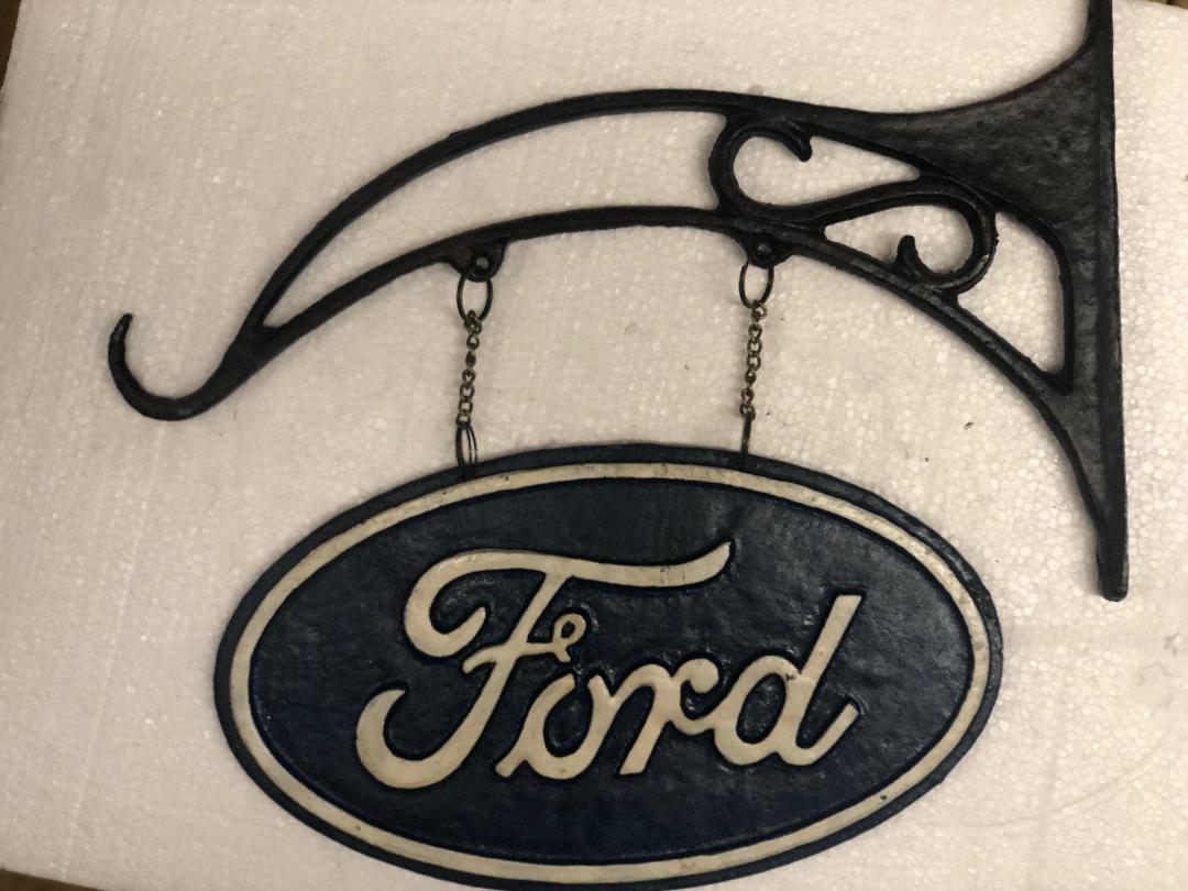 cast iron Ford sign-Jantiques LLC.